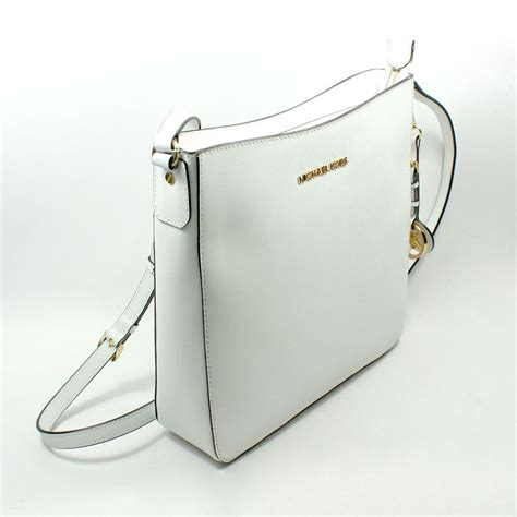 michael kors jet set crossbody small white|Michael Kors woven leather bag.